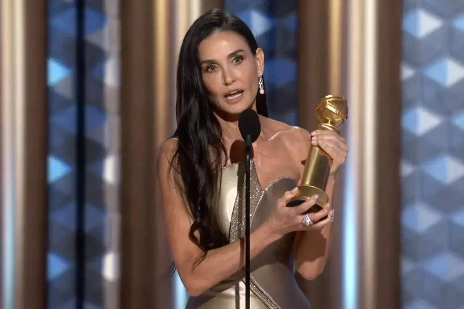 Demi Moore gives emotional Golden Globes speech for what she calls her first acting award: 'I'm just in shock' Related images #4
