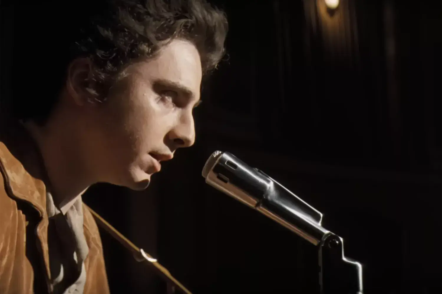 See Timothée Chalamet's Bob Dylan perform "A Hard Rain's A-Gonna Fall" in A Complete Unknown trailer Related images #9